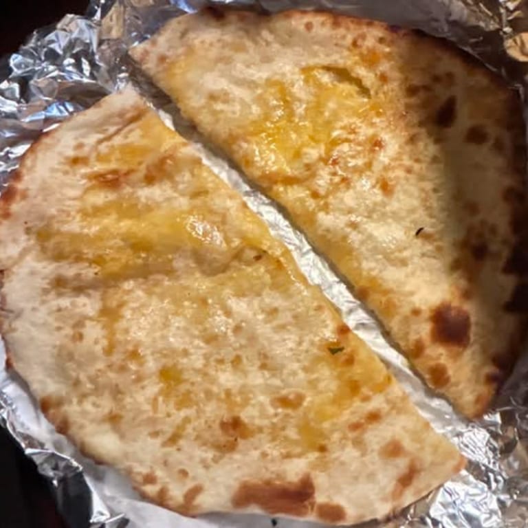 Savor our authentic naan